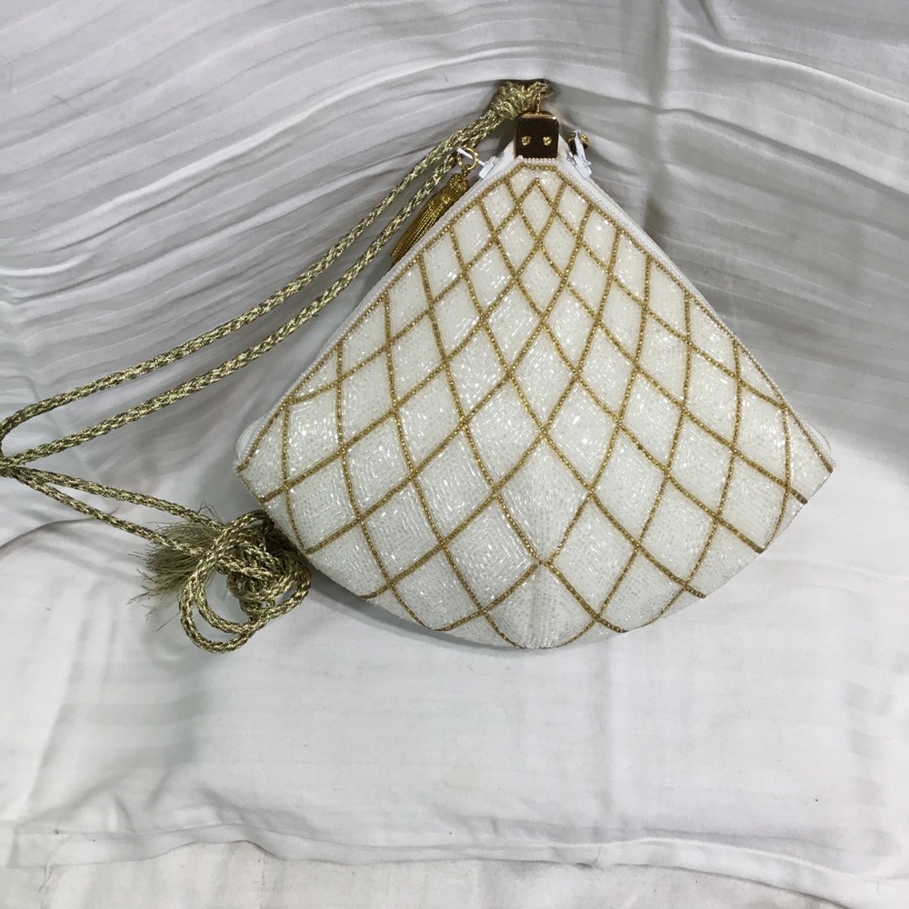 Lovely beaded triangle purse, formal or party, 9” by 7”high zipper closure, NWOT